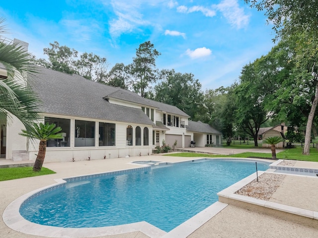 23226 Oak Hollow Ln, Tomball, TX 77377 - view of swimming pool with a patio and a pool with connected hot tub