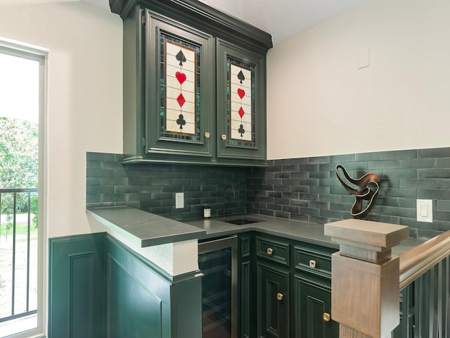 23226 Oak Hollow Ln, Tomball, TX 77377 - indoor wet bar featuring wine cooler and tasteful backsplash