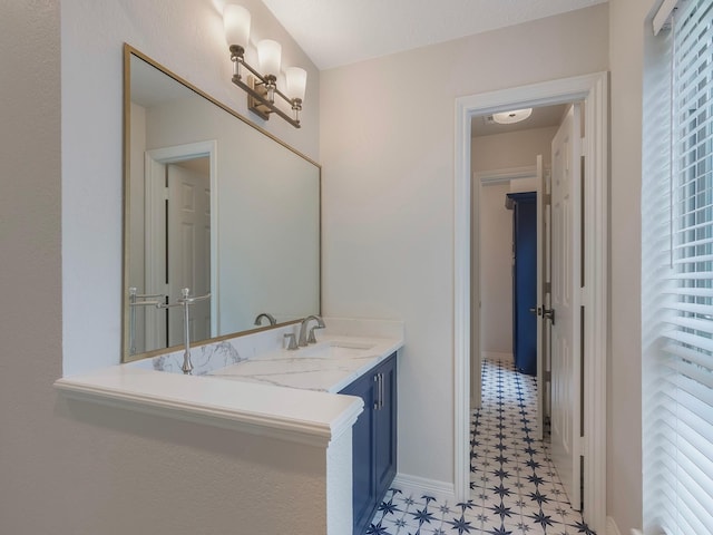23226 Oak Hollow Ln, Tomball, TX 77377 - bathroom with tile patterned floors, vanity, and baseboards