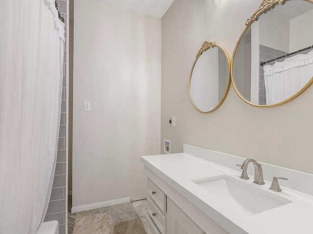 23226 Oak Hollow Ln, Tomball, TX 77377 - full bath with vanity and baseboards