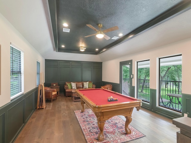 23226 Oak Hollow Ln, Tomball, TX 77377 - recreation room featuring plenty of natural light, ceiling fan, wainscoting, billiards, and a textured ceiling
