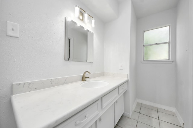 2302 Sun Spring Ct, Spring, TX 77373 - bathroom featuring vanity, tile patterned floors, and baseboards