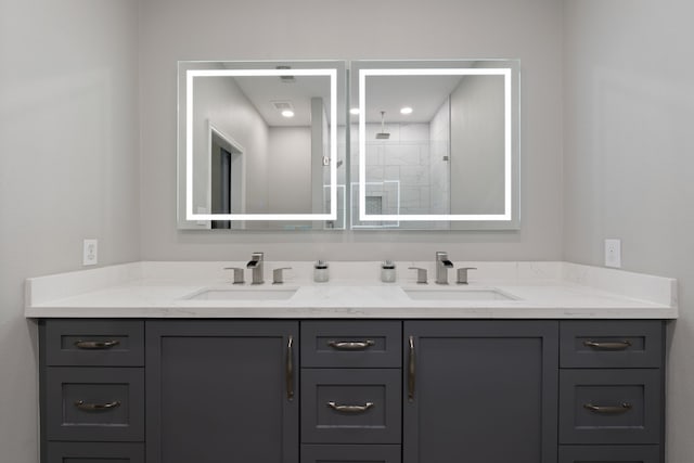 11402 Willis Waukegan Rd, Conroe, TX 77303 - bathroom featuring double vanity and tiled shower