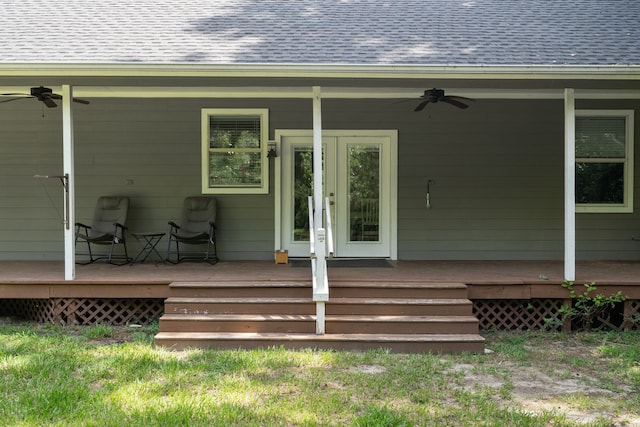 11402 Willis Waukegan Rd, Conroe, TX 77303 - entrance to property with a ceiling fan, a shingled roof, a wooden deck, and french doors