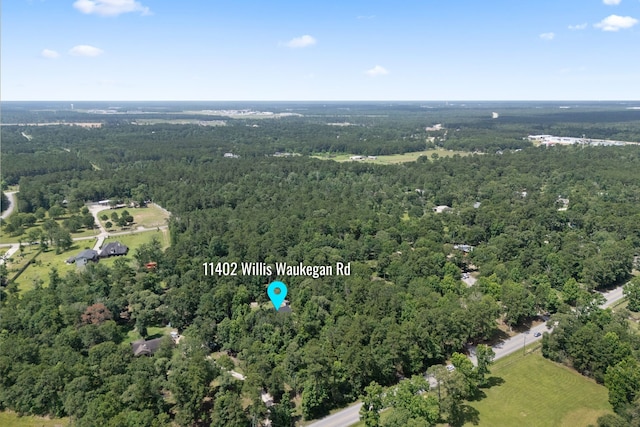 11402 Willis Waukegan Rd, Conroe, TX 77303 - aerial view of property and surrounding area with a forest