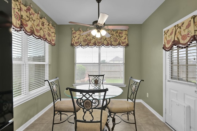 20530 Saddleback Chase Ln, Cypress, TX 77433 - dining space featuring healthy amount of natural light, a ceiling fan, and light tile patterned floors