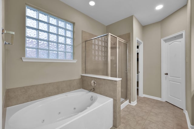 20530 Saddleback Chase Ln, Cypress, TX 77433 - full bath with a stall shower, a whirlpool tub, tile patterned flooring, recessed lighting, and baseboards