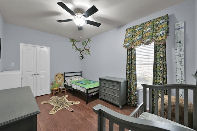 20530 Saddleback Chase Ln, Cypress, TX 77433 - bedroom featuring dark wood-style flooring, a ceiling fan, and a closet