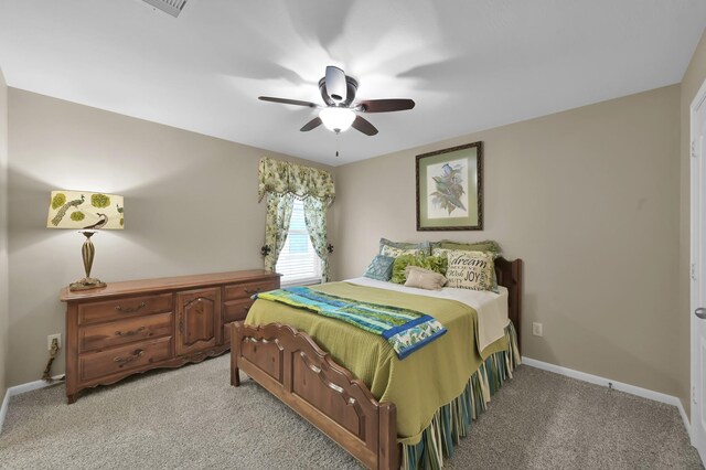 20530 Saddleback Chase Ln, Cypress, TX 77433 - bedroom featuring light carpet, a ceiling fan, and baseboards