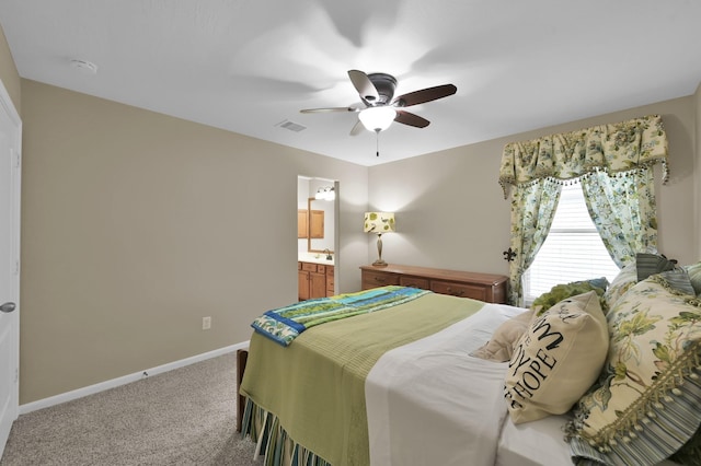 20530 Saddleback Chase Ln, Cypress, TX 77433 - carpeted bedroom featuring baseboards, ceiling fan, and ensuite bathroom