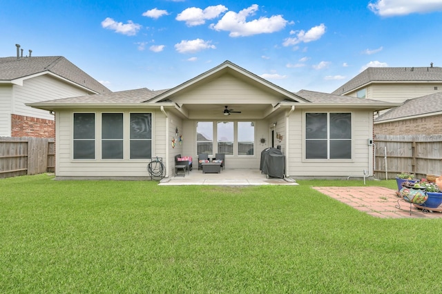 20530 Saddleback Chase Ln, Cypress, TX 77433 - back of house with ceiling fan, a patio, an outdoor living space, and roof with shingles