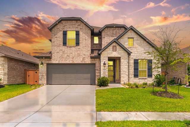 27976 Seger Bend Trl, Spring, TX 77386 - view of front of house featuring an attached garage, a front lawn, concrete driveway, and stone siding