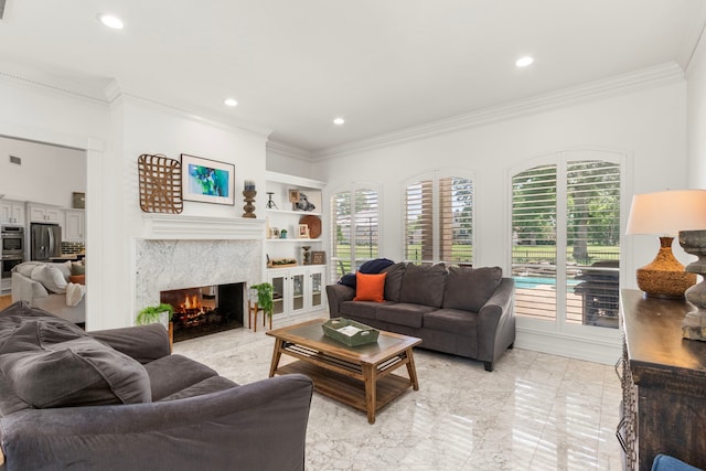 2623 Old S Dr, Richmond, TX 77406 - living area with light marble finish flooring, healthy amount of natural light, a premium fireplace, ornamental molding, and recessed lighting