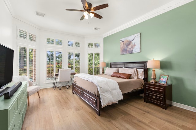 2623 Old S Dr, Richmond, TX 77406 - bedroom with ornamental molding, baseboards, light wood-style flooring, and a ceiling fan