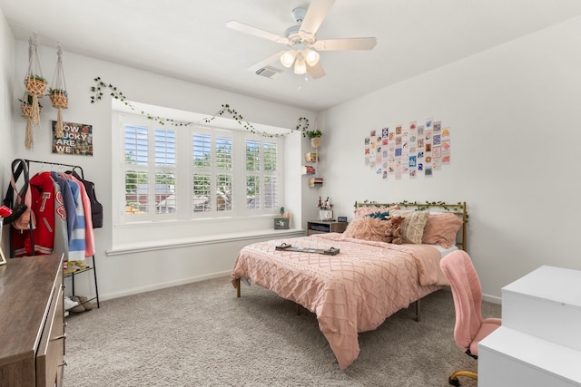 2623 Old S Dr, Richmond, TX 77406 - carpeted bedroom with baseboards and a ceiling fan