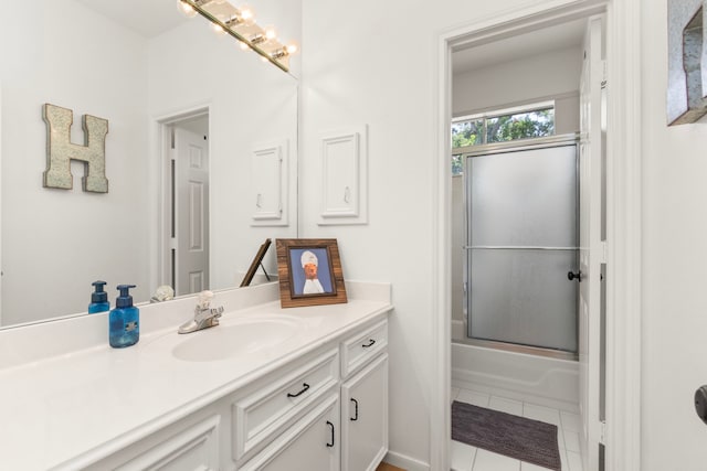 2623 Old S Dr, Richmond, TX 77406 - bathroom featuring vanity, combined bath / shower with glass door, and tile patterned floors