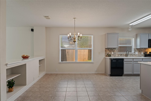 19126 Edens Dawn Dr, Tomball, TX 77375 - kitchen with dishwasher, a chandelier, gray cabinets, and light countertops
