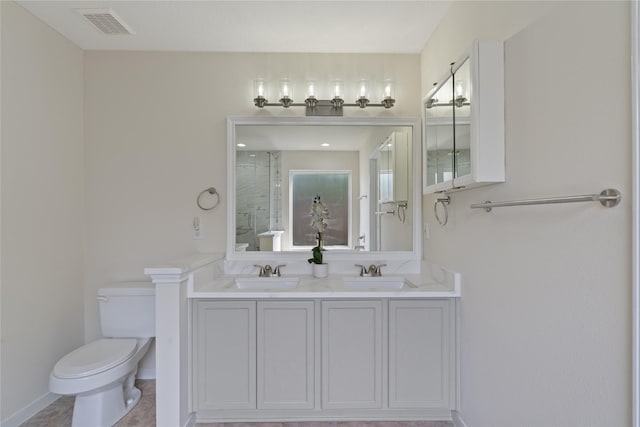 19126 Edens Dawn Dr, Tomball, TX 77375 - bathroom with toilet, an enclosed shower, double vanity, and baseboards