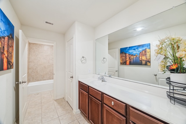 15203 Albert Oak Dr, Humble, TX 77396 - full bathroom with tile patterned floors, vanity, and baseboards