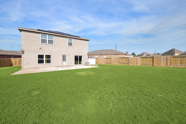 15203 Albert Oak Dr, Humble, TX 77396 - back of house with a patio area, solar panels, and central air condition unit