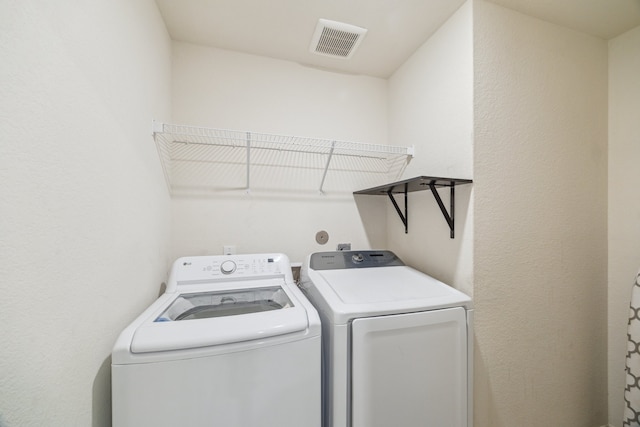 15203 Albert Oak Dr, Humble, TX 77396 - laundry area featuring washer and dryer
