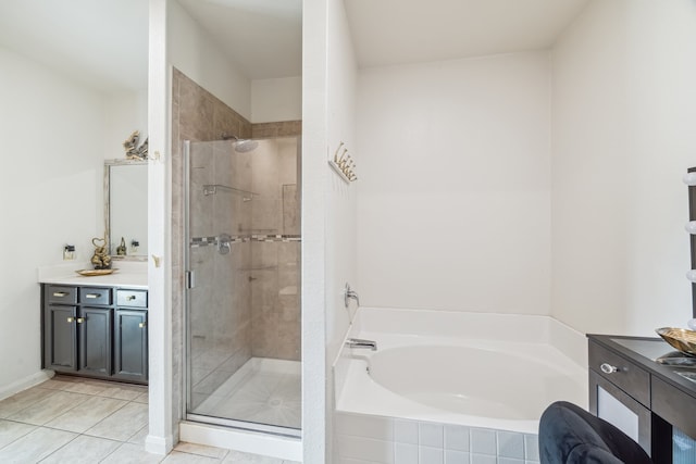15203 Albert Oak Dr, Humble, TX 77396 - full bath featuring a bath, vanity, a stall shower, and tile patterned flooring