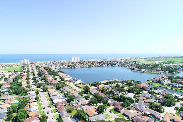 2402 Pine St, Galveston, TX 77551 - aerial view of property and surrounding area featuring a nearby body of water and nearby suburban area