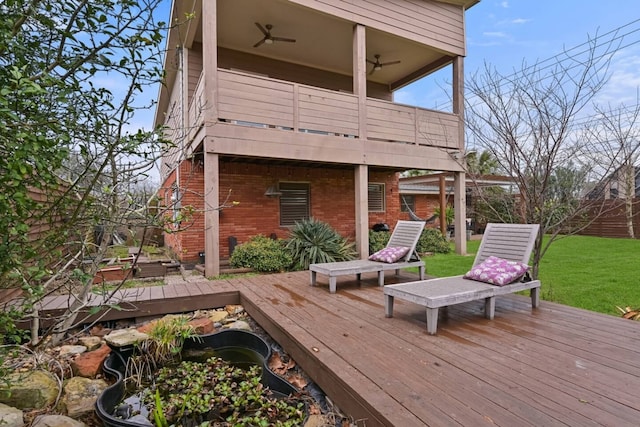 2402 Pine St, Galveston, TX 77551 - deck with ceiling fan and a yard