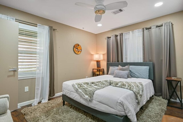 2402 Pine St, Galveston, TX 77551 - bedroom with baseboards, ceiling fan, wood finished floors, and recessed lighting