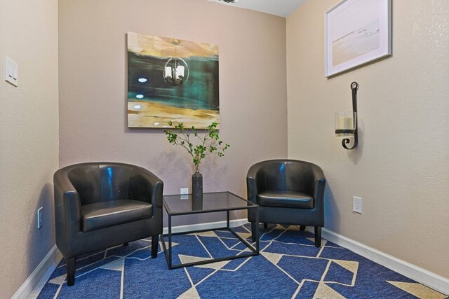 2402 Pine St, Galveston, TX 77551 - living area with baseboards and carpet floors