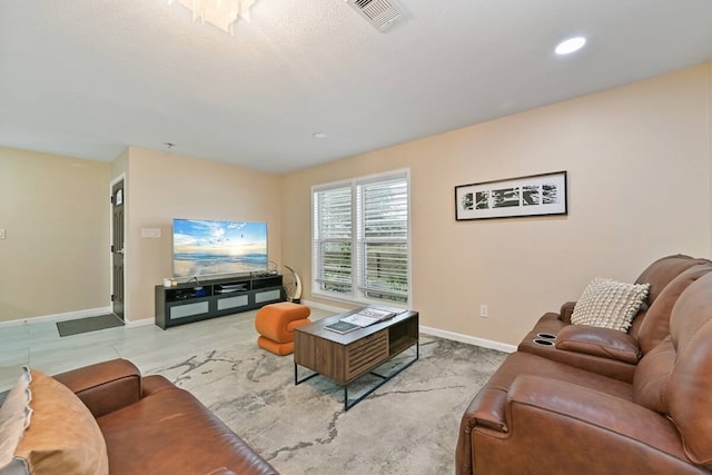 2402 Pine St, Galveston, TX 77551 - living room featuring baseboards and recessed lighting