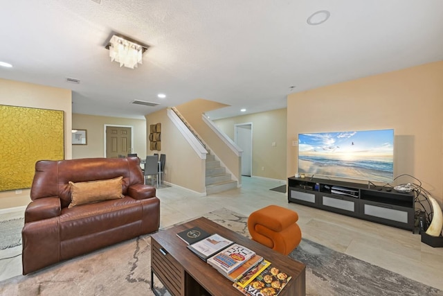 2402 Pine St, Galveston, TX 77551 - living room featuring stairs, recessed lighting, and baseboards