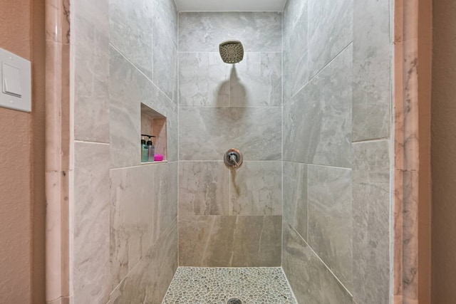 2402 Pine St, Galveston, TX 77551 - full bathroom featuring a tile shower