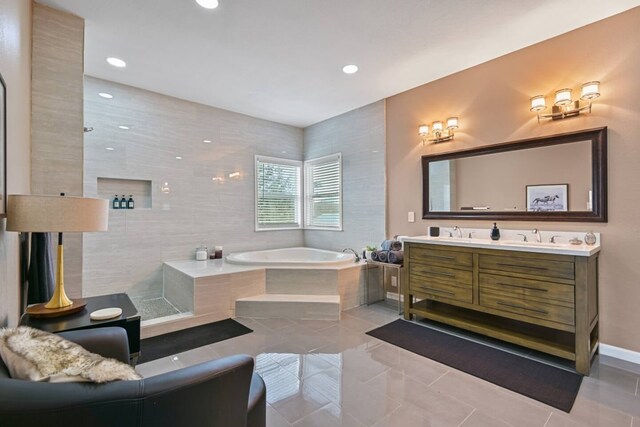 2402 Pine St, Galveston, TX 77551 - full bath with a garden tub, double vanity, tile patterned flooring, and recessed lighting