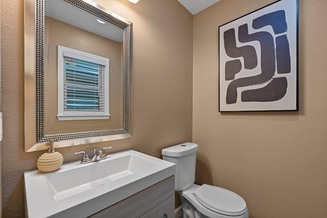 2402 Pine St, Galveston, TX 77551 - half bath featuring vanity and toilet