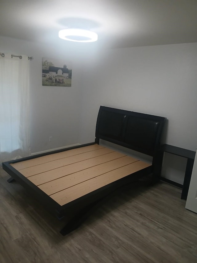 12500 Sandpiper Dr Unit 66, Houston, TX 77035 - bedroom featuring wood finished floors