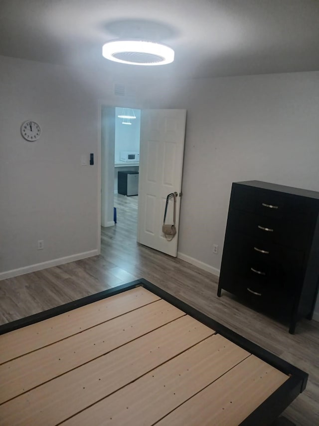 12500 Sandpiper Dr Unit 66, Houston, TX 77035 - unfurnished room featuring wood finished floors and baseboards