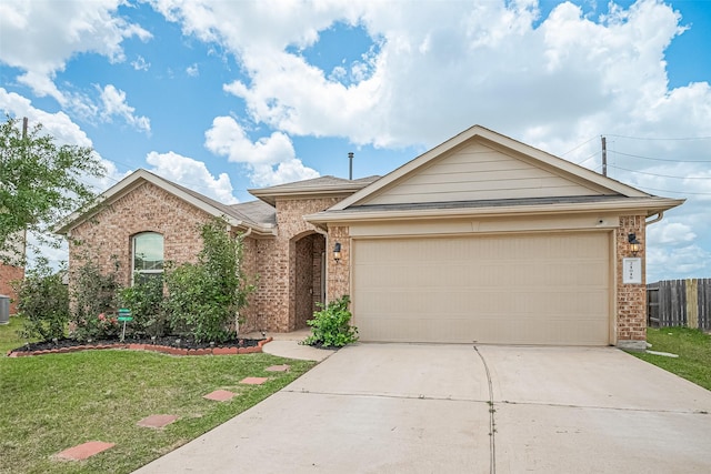 21018 Whitehaven Bluff Trl, Katy, TX 77449 - ranch-style home with brick siding, concrete driveway, a garage, and central AC