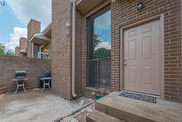 13798 Hollowgreen Dr Unit 305, Houston, TX 77082 - entrance to property featuring brick siding and a patio area