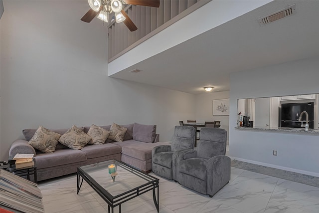 13798 Hollowgreen Dr Unit 305, Houston, TX 77082 - living room featuring marble finish flooring and ceiling fan