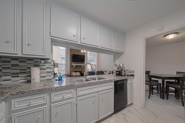 13798 Hollowgreen Dr Unit 305, Houston, TX 77082 - kitchen featuring black dishwasher, tasteful backsplash, light marble finish flooring, white cabinetry, and light stone counters