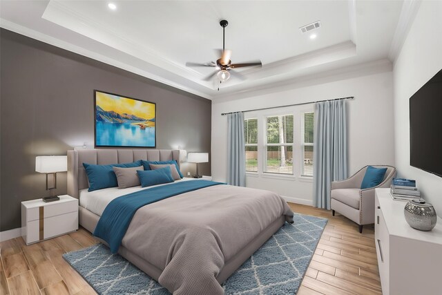 58-D Hickory Ridge Dr, Huffman, TX 77336 - bedroom with a tray ceiling, ornamental molding, light wood finished floors, recessed lighting, and baseboards