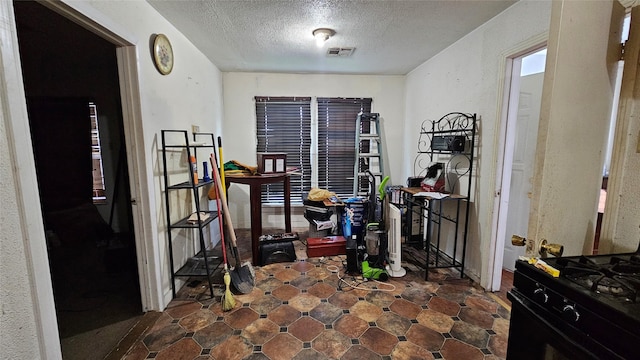 7622 Delavan Dr, Houston, TX 77028 - dining area with a textured ceiling
