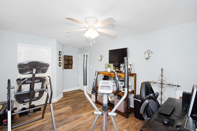 120 Brazos River Rd Unit 400, Freeport, TX 77541 - workout area featuring wood finished floors and a ceiling fan