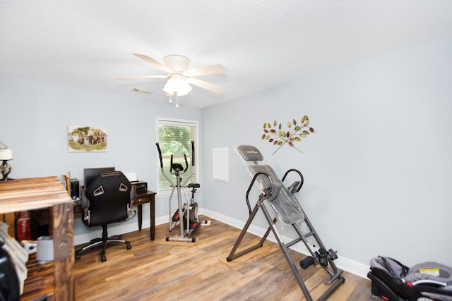 120 Brazos River Rd Unit 400, Freeport, TX 77541 - office area with light wood-style floors and a ceiling fan