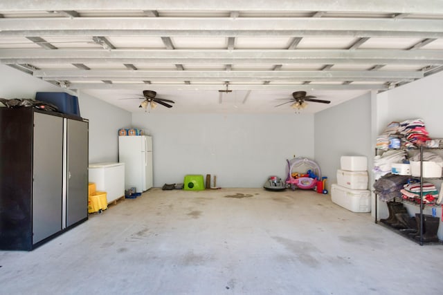 120 Brazos River Rd Unit 400, Freeport, TX 77541 - garage featuring freestanding refrigerator and ceiling fan