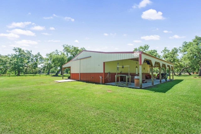 120 Brazos River Rd Unit 400, Freeport, TX 77541 - view of grassy yard featuring a patio area