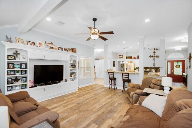 120 Brazos River Rd Unit 400, Freeport, TX 77541 - living area featuring ceiling fan, light wood finished floors, crown molding, recessed lighting, and beamed ceiling