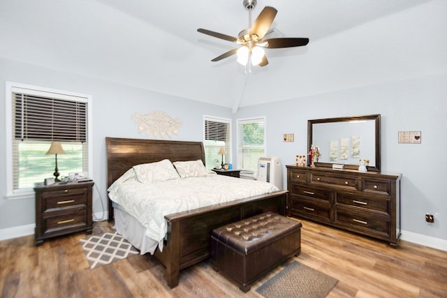 120 Brazos River Rd Unit 400, Freeport, TX 77541 - bedroom featuring lofted ceiling, light wood-type flooring, and ceiling fan