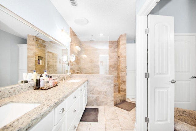 120 Brazos River Rd Unit 400, Freeport, TX 77541 - full bath featuring walk in shower, double vanity, and tile patterned floors